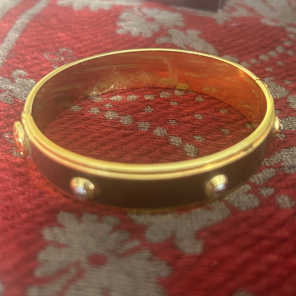 Henri Bendel Gold and Brown Bracelet . Great condition.